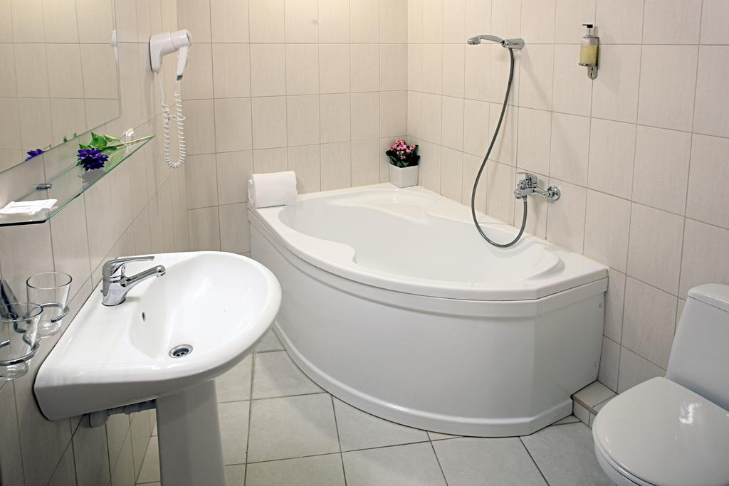 Hotel Promenada Клайпеда Стая снимка